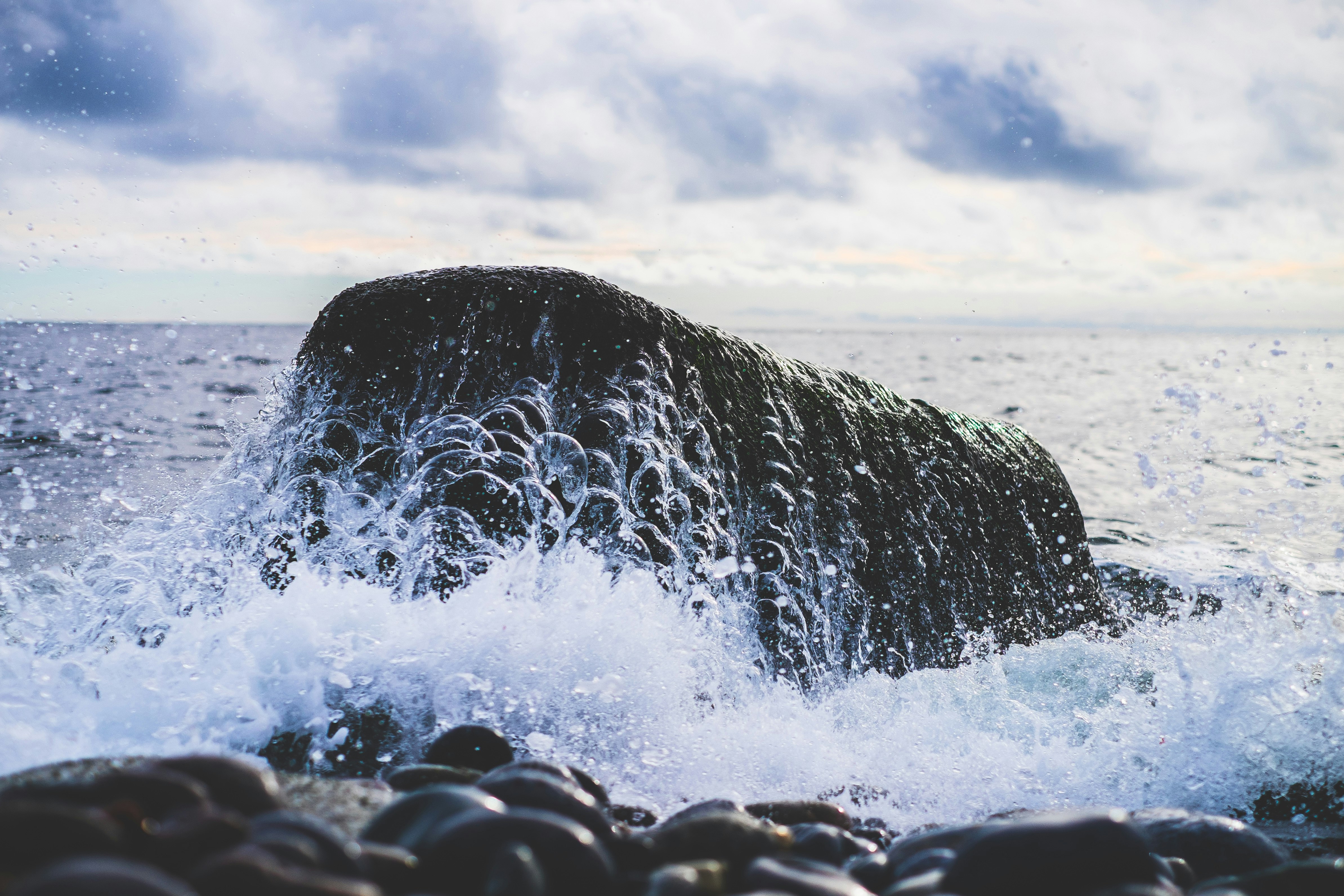 rock formation in body of water